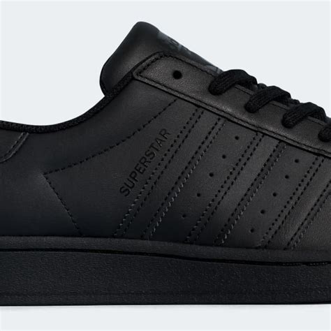 black adidas originals shoes.